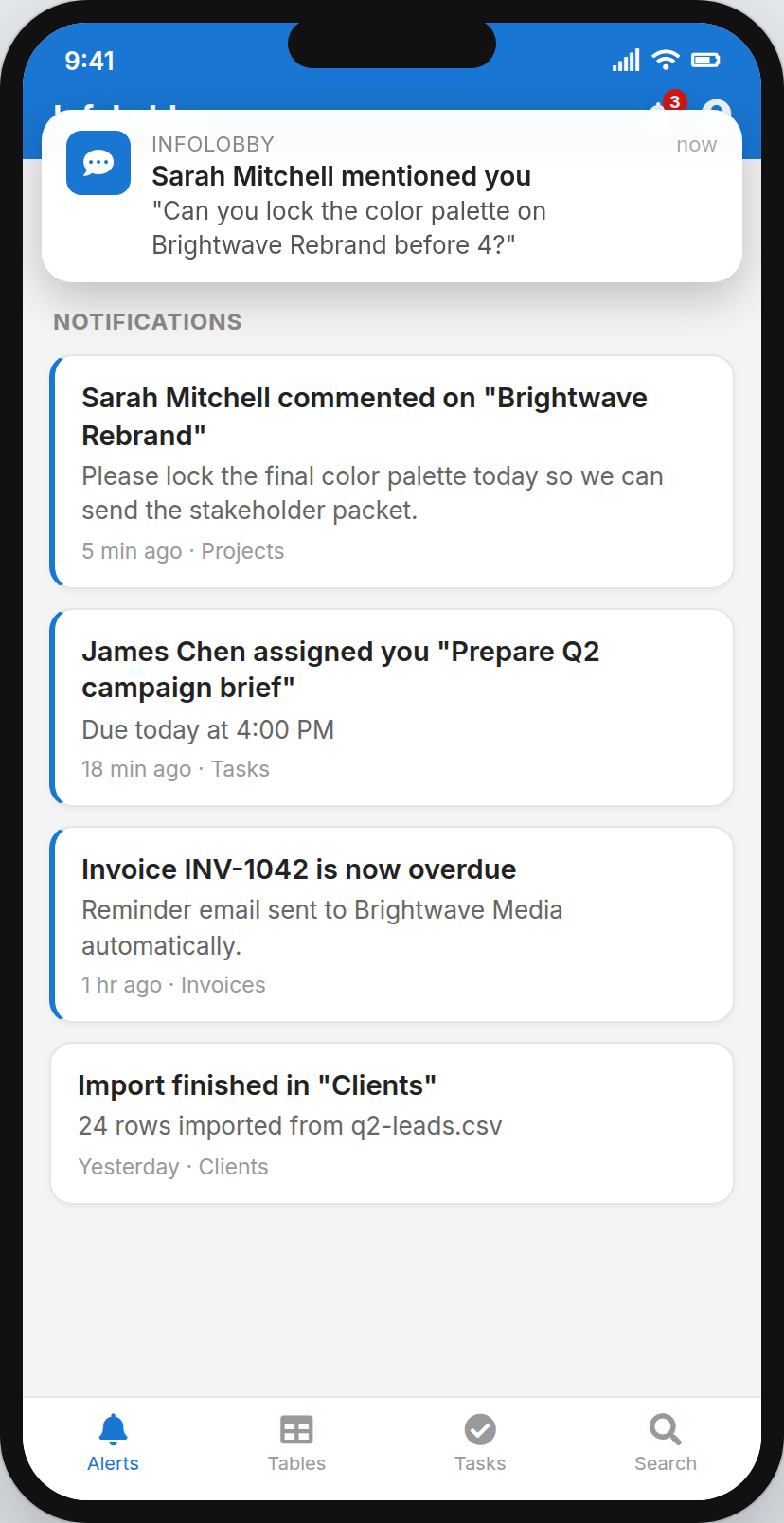 InfoLobby on a phone showing a push notification over the notifications list